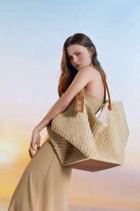 Look stylish as you beat the heat with the modern and functional UFO Collection. Shop the collection’s unique raffia pieces today.