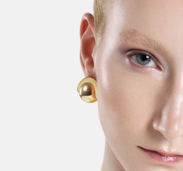 Casa Batlló ball earrings in gold