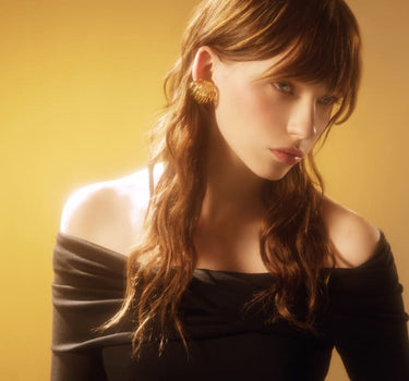 Pendiente de espiral de oro