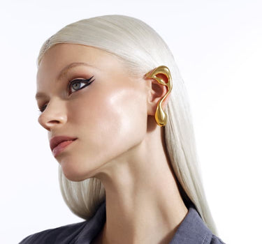 asymmetrical liquid earring in gold