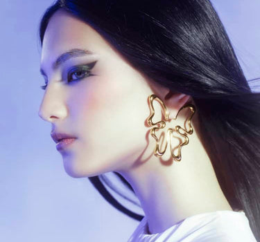 Pendiente de mariposa de oro