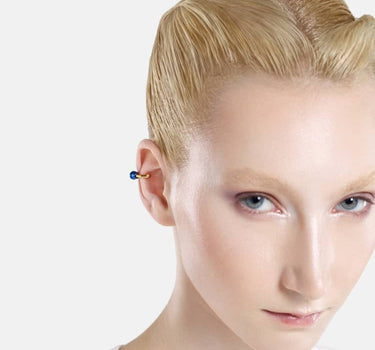 Casa Batlló huggie earcuff in gold and blue