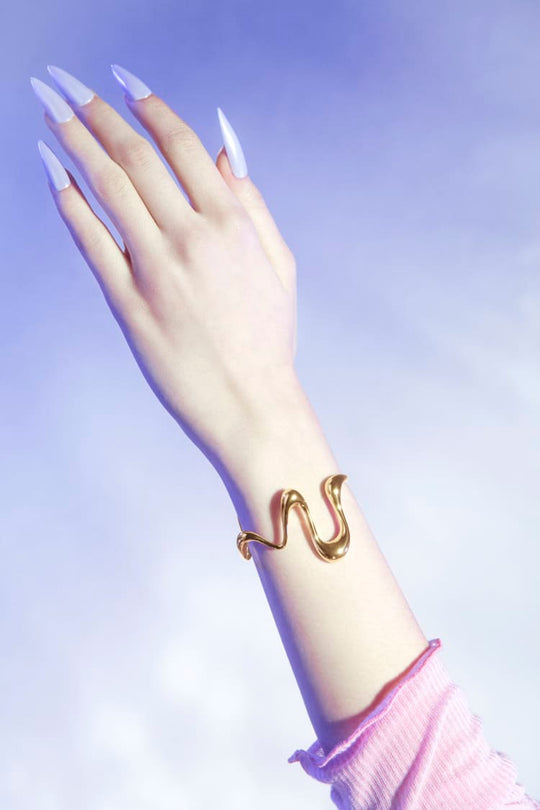 Liquid bangle bracelet in gold