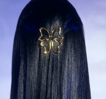 Pinza para el cabello con forma de mariposa en color dorado