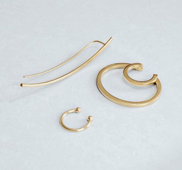 Juego de ear cuffs de oro