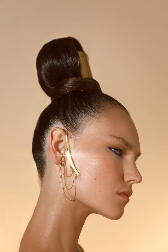 18K gold ear cuff with draped chain