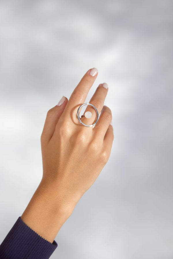 Silver circular ring with white quartz