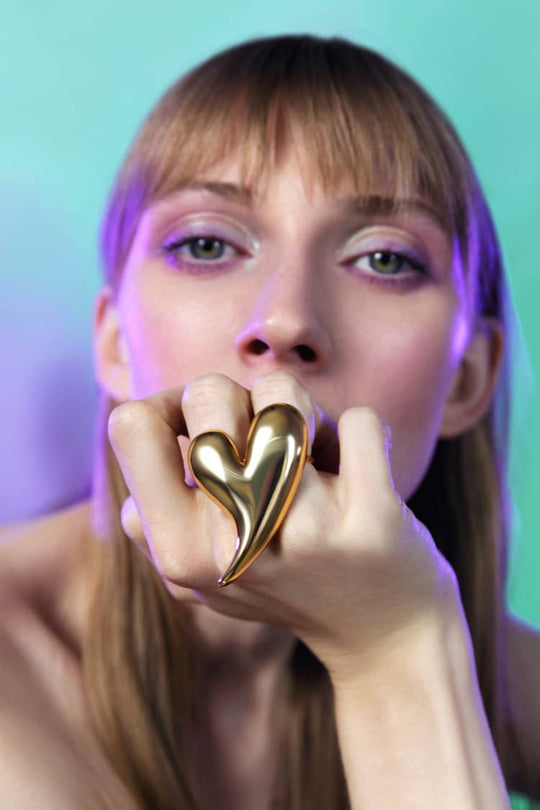 big heart shaped ring in gold