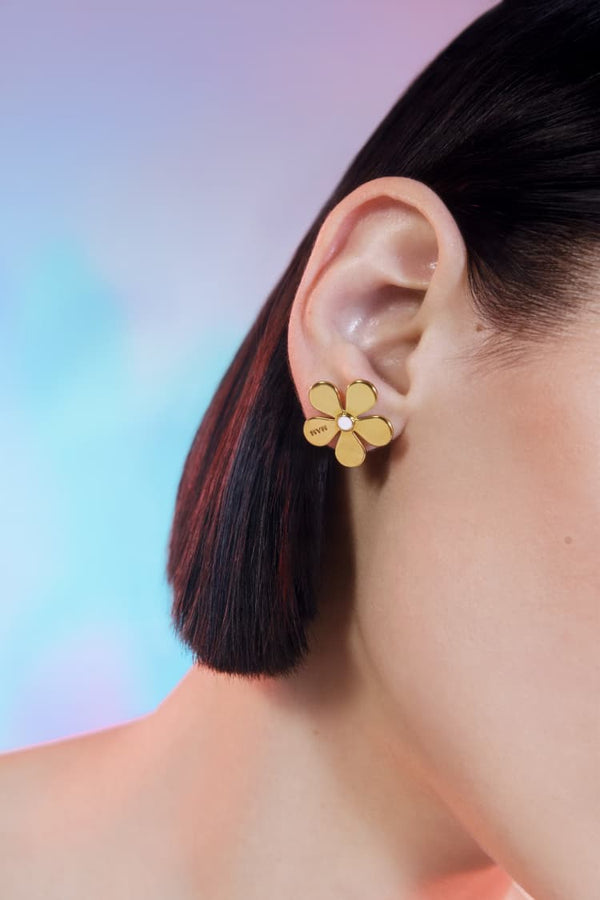 daisy stud earrings in gold