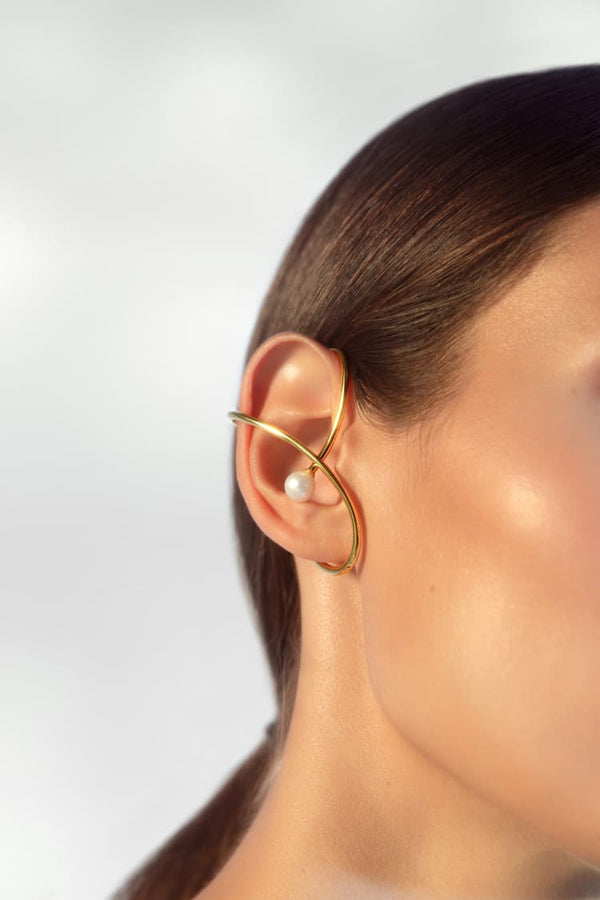 Gold ear cuff with pearl stone