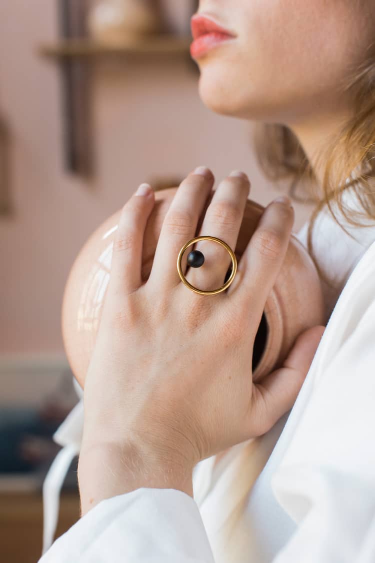 Gold ring with wood pearl